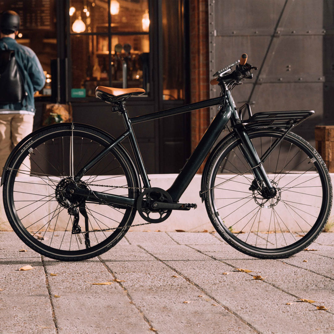 Momentum Voya ebike with front storage rack and mudguards