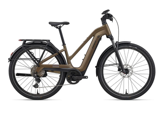 2026 Giant Explore E+ 3 STA electric bike in Pyrite Brown, side view